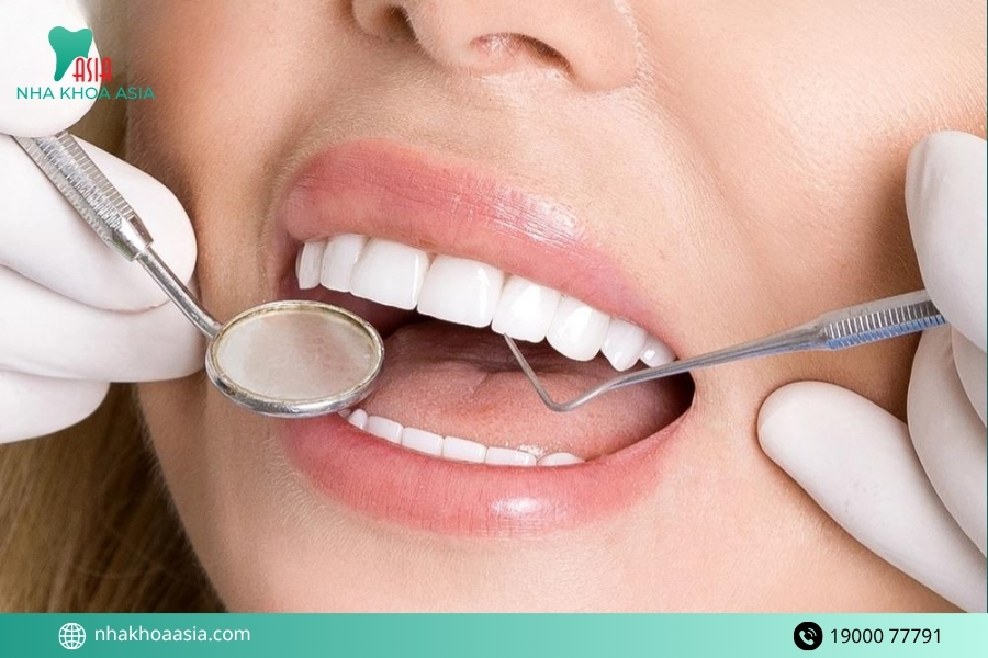Bọc răng sứ bị đau chân răng nguyên nhân do đâu?