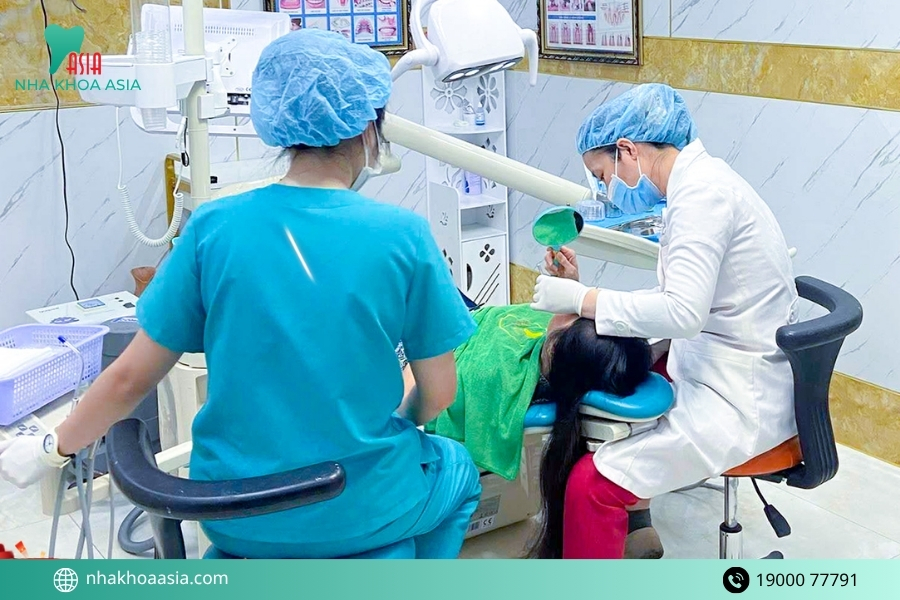Bọc răng sứ bị đau chân răng nguyên nhân do đâu?
