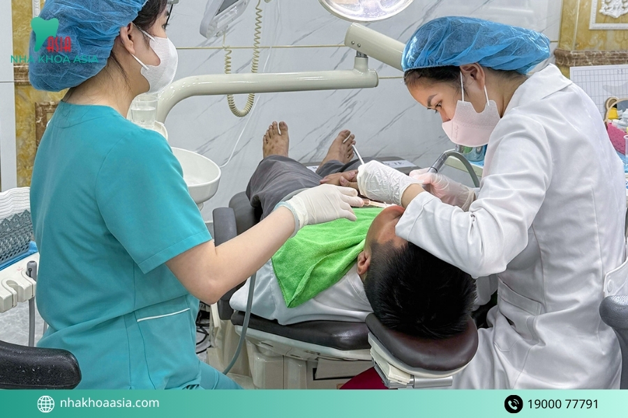 Bọc răng sứ bị đau chân răng nguyên nhân do đâu?