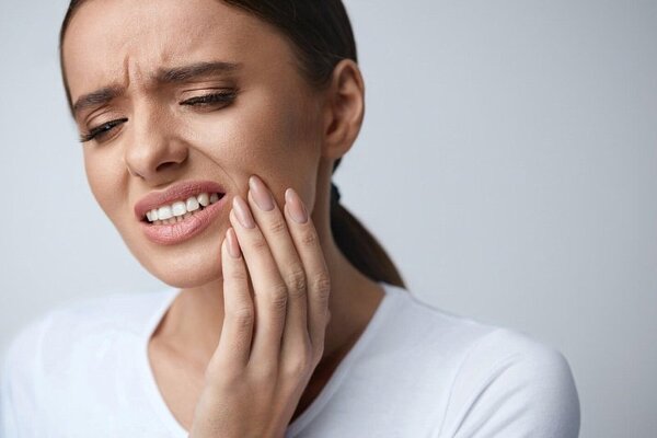 Bấm huyệt chữa đau răng không giảm đau răng nên làm gì?
